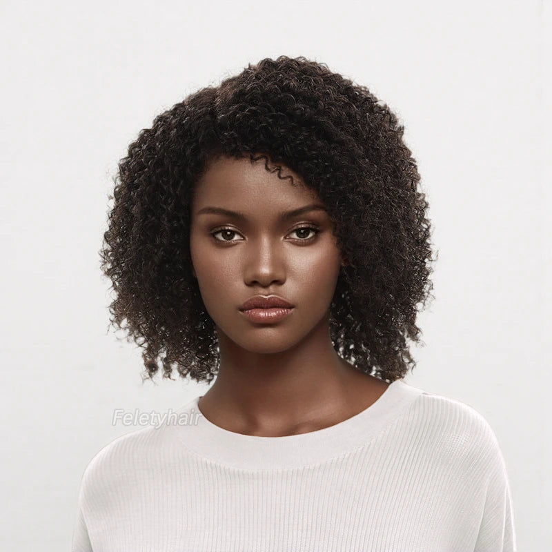 black woman wearing black bohemian curly wig