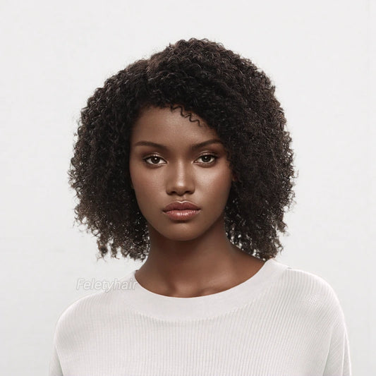 black woman wearing black bohemian curly wig