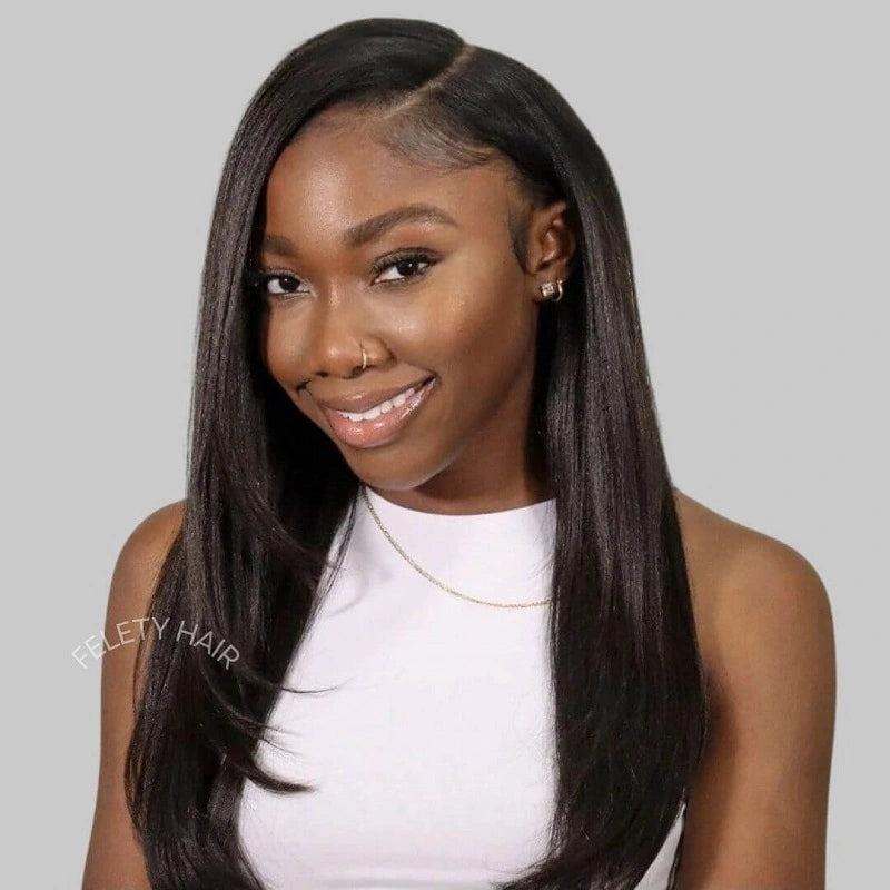 Black woman over 40 smiling,wearing yaki straight clip-in extensions